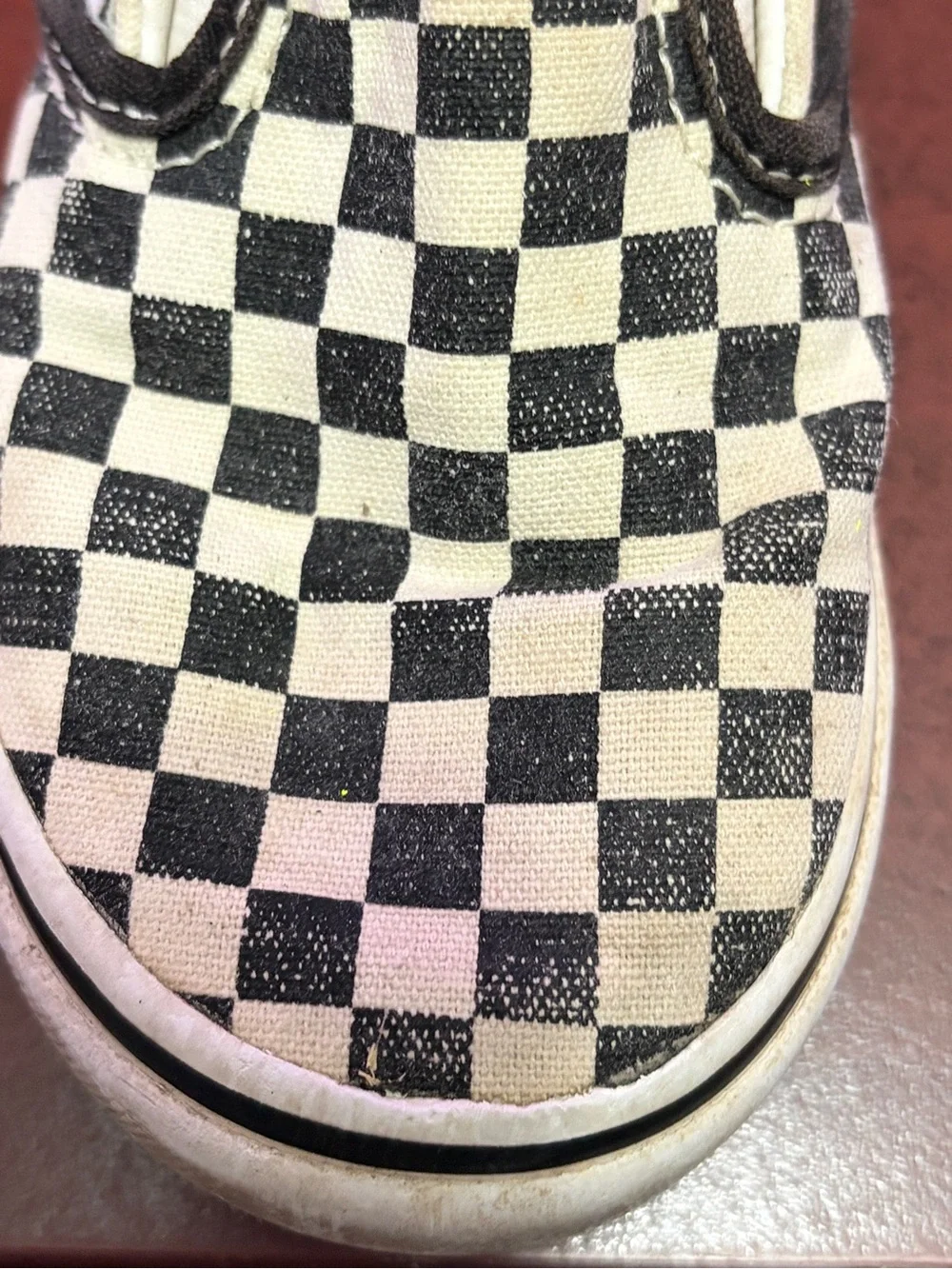 Vans Kids Slip-On Checkerboard Sneakers in Black and Cream